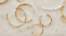 Load image into Gallery viewer, big solid hoop and a smaller version of the same hoop. gold with pushback clutch