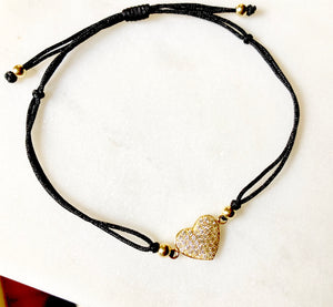 925 Sterling Silver/Gold Plated Heart bracelet. Perfect layering piece that add a little love to your day.  Stack it with any one of your favorite wristwear.